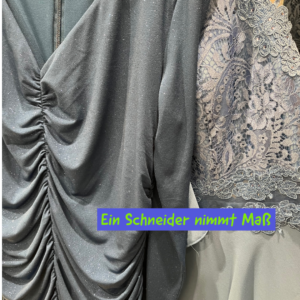 Ein Schneider nimmt Maß